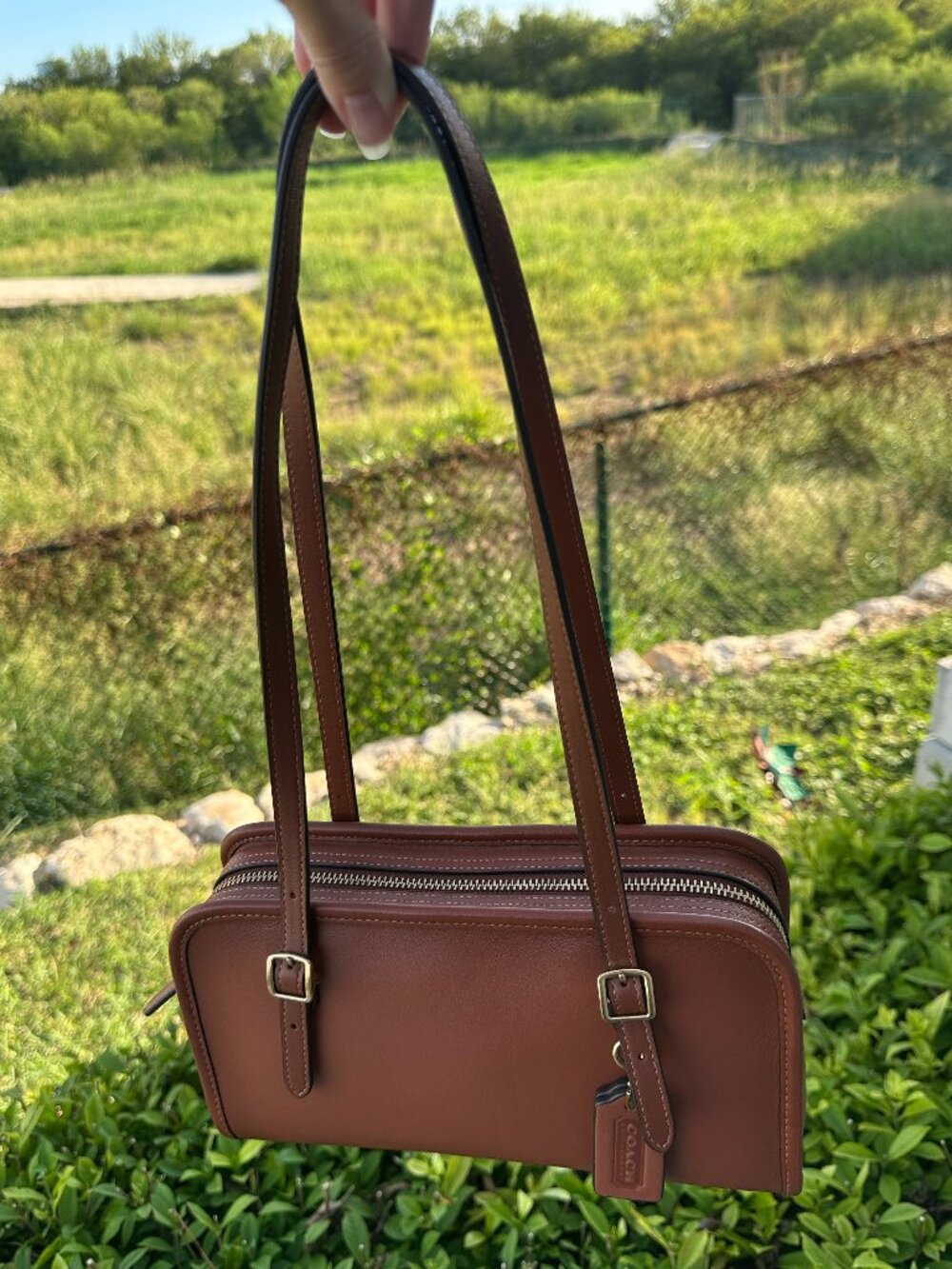 Coach Swing Zip Saddle